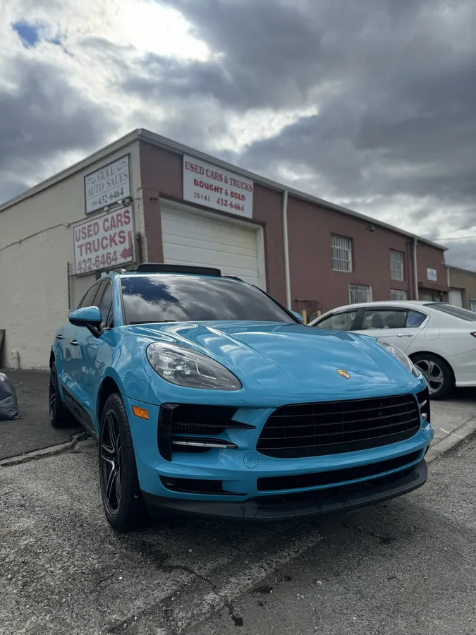 Miami Blue Porsche Macan in the shop